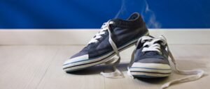 A pair of sneakers emitting foul odors